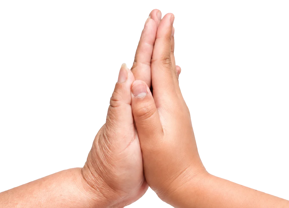 Two hands pressed together on a yellow background